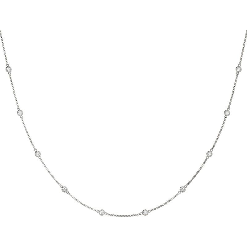 Diamond station necklace in white gold. 