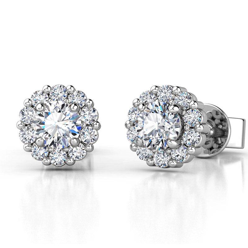 Daisy - round diamond cluster earrings. Centre 0.20ct round diamond and halo of smaller diamonds. Total 0.70 carats