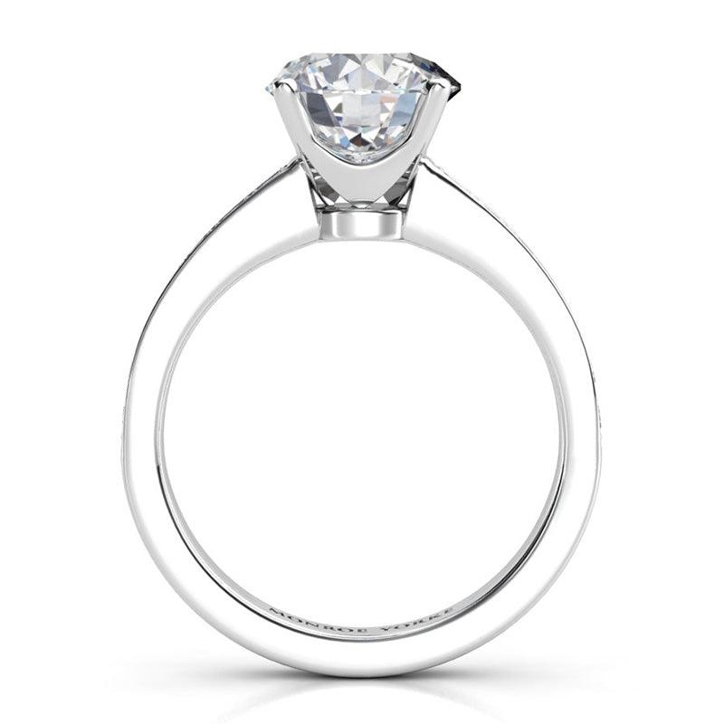 Danae - Round diamond ring. Platinum diamond ring. Side view, showing the beautiful centre setting.