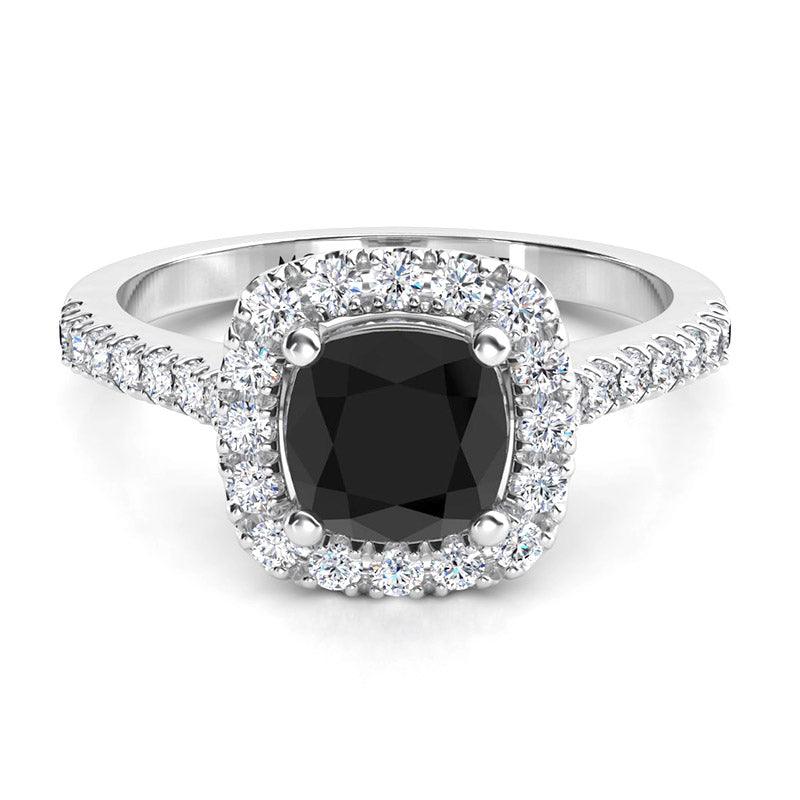 Black diamond rig with a cushion cut centre diamond in a halo setting with diamonds on the band. Platinum
