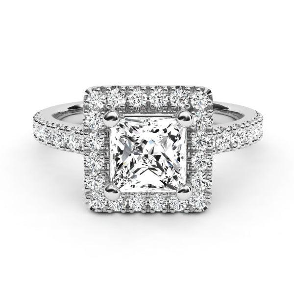 Princess cut diamond halo engagement ring in white gold. 