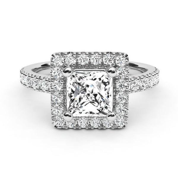 Princess cut diamond halo engagement ring in white gold. 