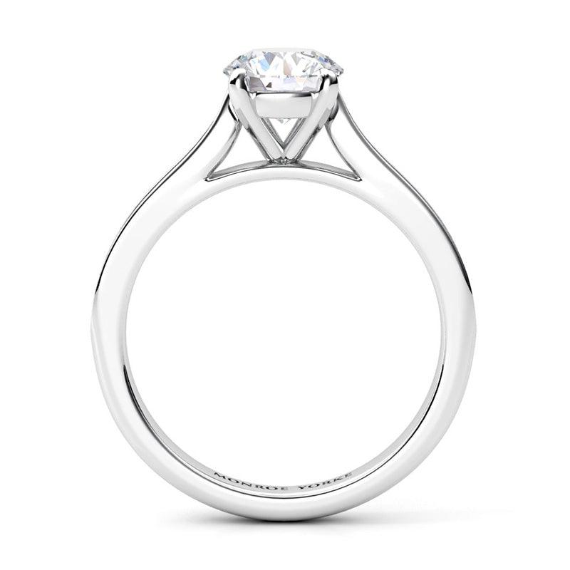Denver in platinum, side view - Four claw round brilliant cut centre diamond setting
