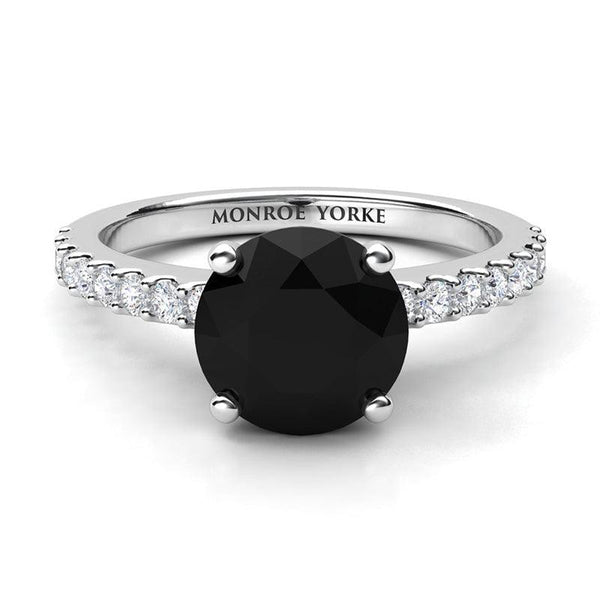 Desir Black Diamond Engagement Ring with white diamonds on the band. White gold or platinum
