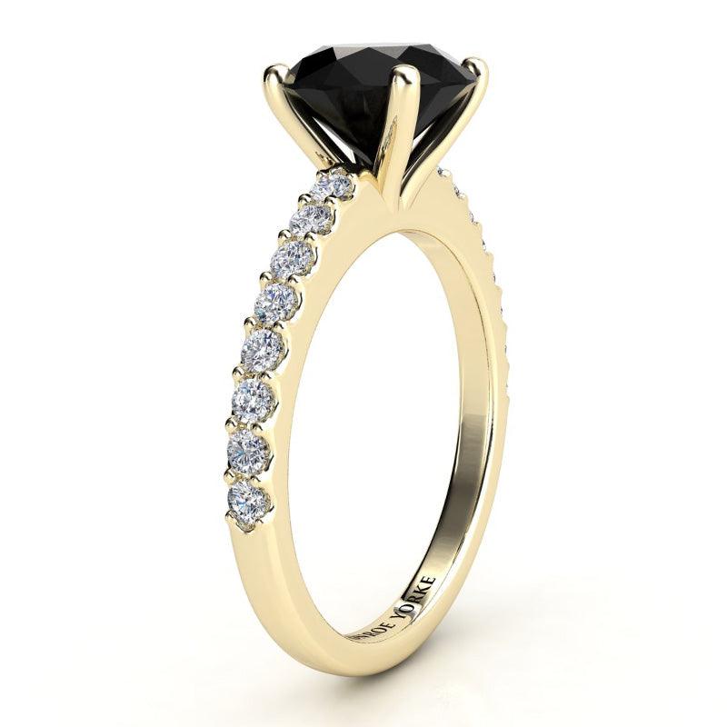 Desir - Gold black diamond ring - Side View. 1.50 carat round black diamond centre . White diamonds down the band. 