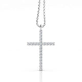 Diamond cross pendant. 0.35 carats of round diamonds. No metal visible from front. 