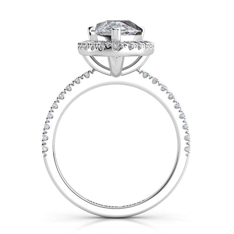 Side view 2: Showing the beautiful centre halo setting and diamond set band.