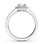 Ecco in platinum - Side view: round diamond halo ring with a low centre setting.  