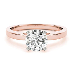 Elora in rose gold.  Four claw solitaire diamond ring.  Centre round brilliant cut diamond. 