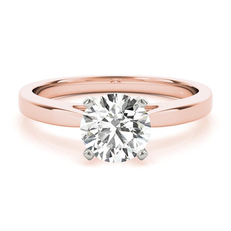 Elora in rose gold.  Four claw solitaire diamond ring.  Centre round brilliant cut diamond. 