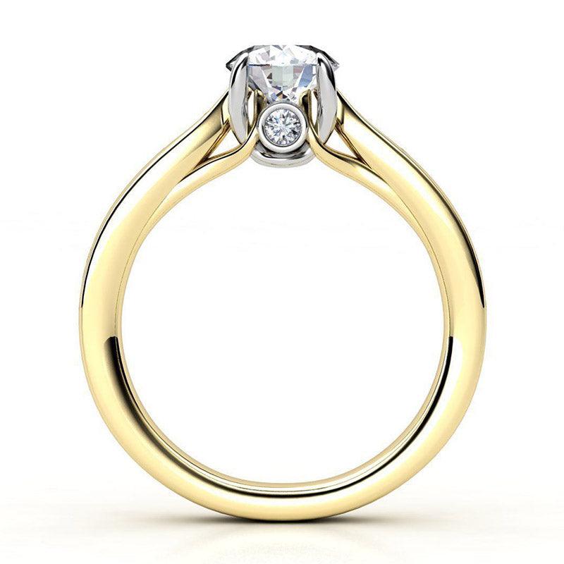 Emele - Yellow Gold Diamond Engagement Ring. Side View showing the intricate details of the centre setting. 