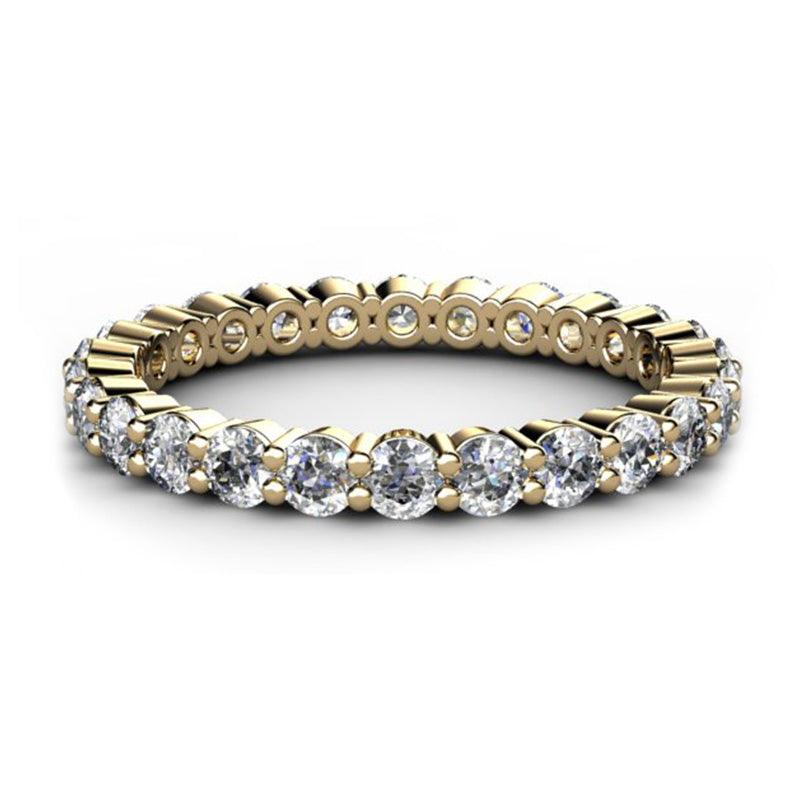 Eternity in yellow gold - round diamonds set right around the band. 