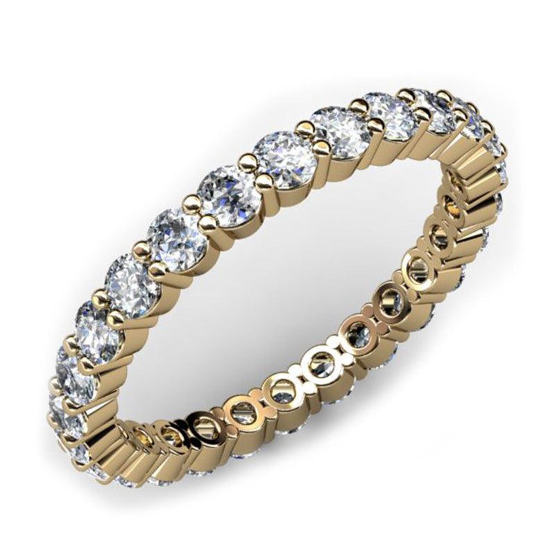 Eternity in yellow gold - gold diamond wedding band or anniversary ring with round diamonds set right around the band. 