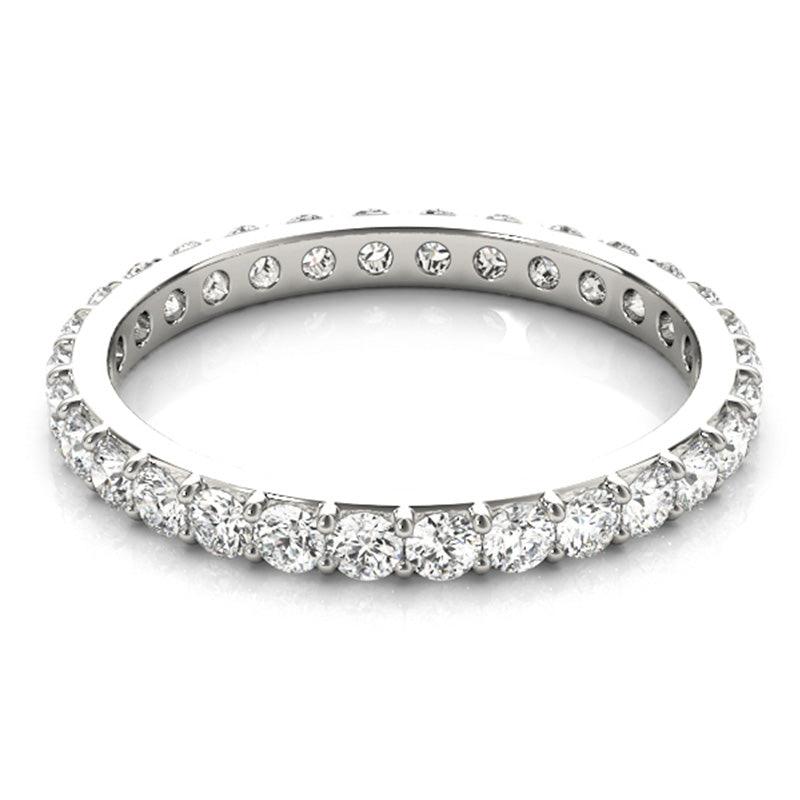 Evie diamond wedding and eternity ring. Diamonds all the way around the band. 