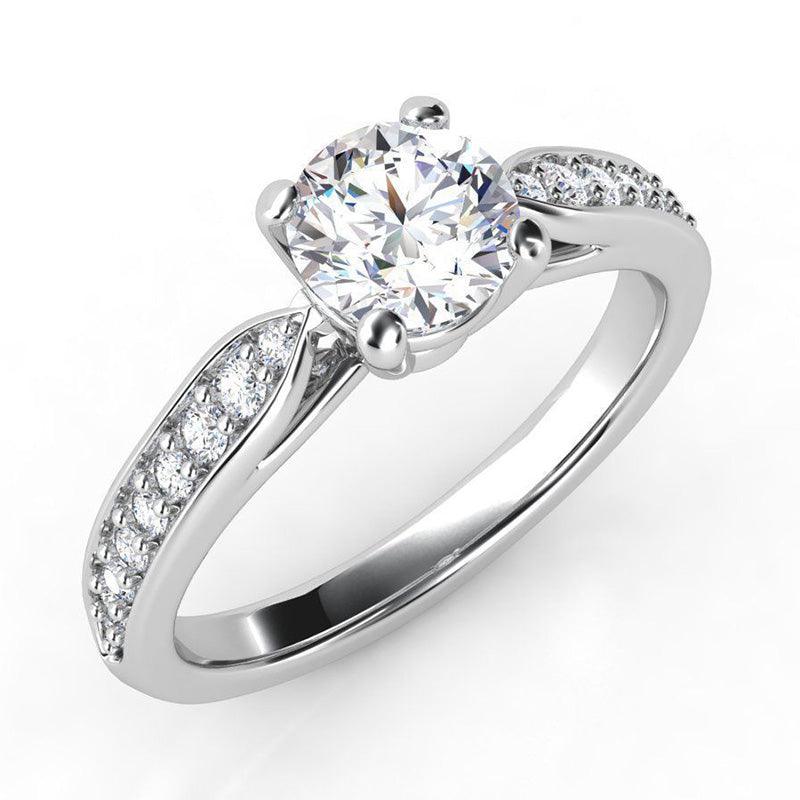 Felice - Diamond ring with diamonds on the shoulders. Centre diamond in a 4 claw setting. 18ct white gold 