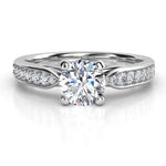 Felice - engagement ring with diamonds on the band. Band tapers into the centre setting. White gold