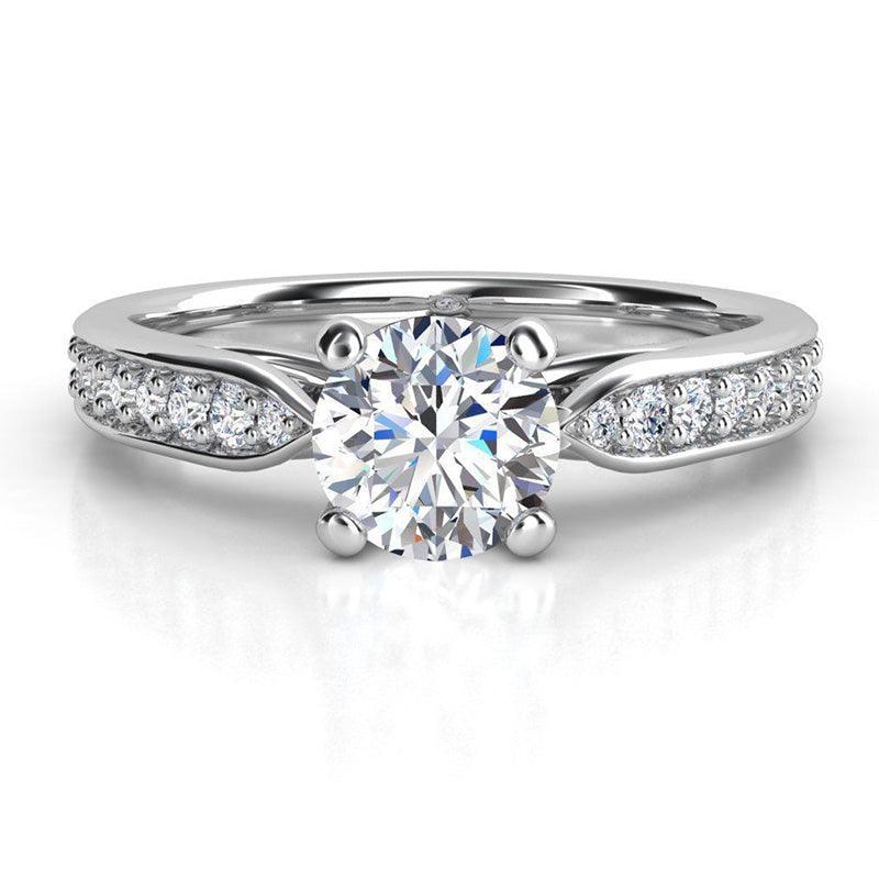 Felice in platinum - engagement ring with diamonds on the band. Band tapers into the centre setting. 
