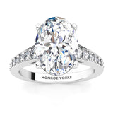 Finley engagement ring in white gold.  Centre premium oval cut diamonds in a 4 claw setting.  Graduated band with diamonds
