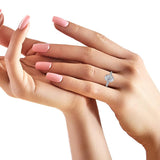 Finley oval shaped diamond engagement ring on a hand