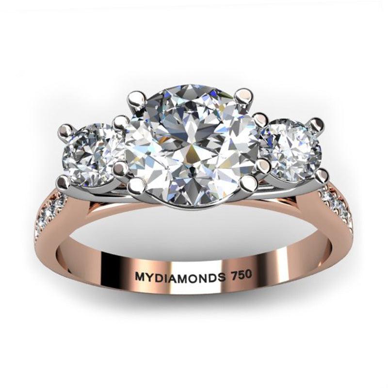 Forever - Top view. 18ct Rose Gold Diamond Trilogy, Three Stone Ring.  Rose gold band and white gold centre setting.  Diamonds set on the sweep up band. 