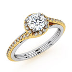Unique two tone halo diamond engagement ring in yellow and white gold. 