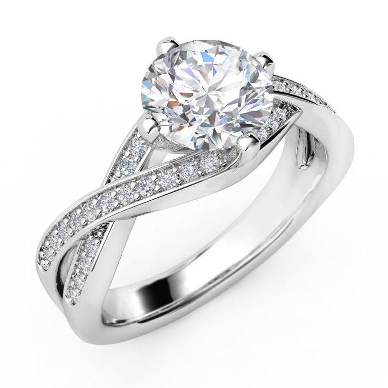 unique diamond engagement ring in white gold. Intertwined bands