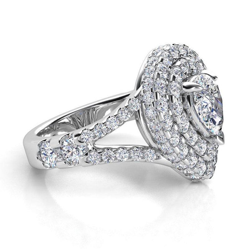 Gilana - Pear cut diamond, double halo ring. Side view. showing the beautiful detail of this ring. 