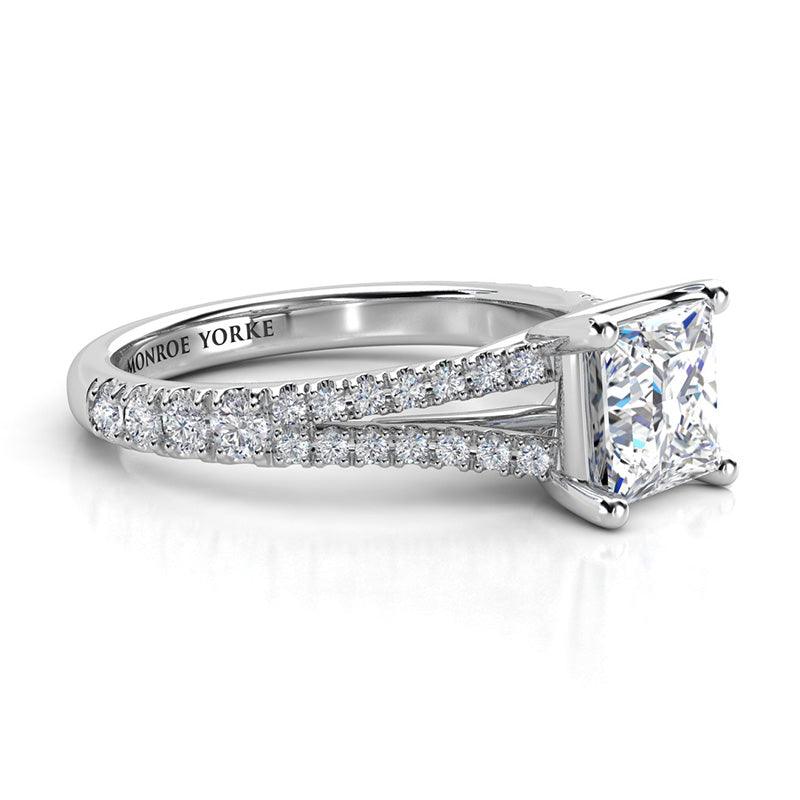 Gemma - Platinum princess cut diamond engagement ring.  Side view showing split band