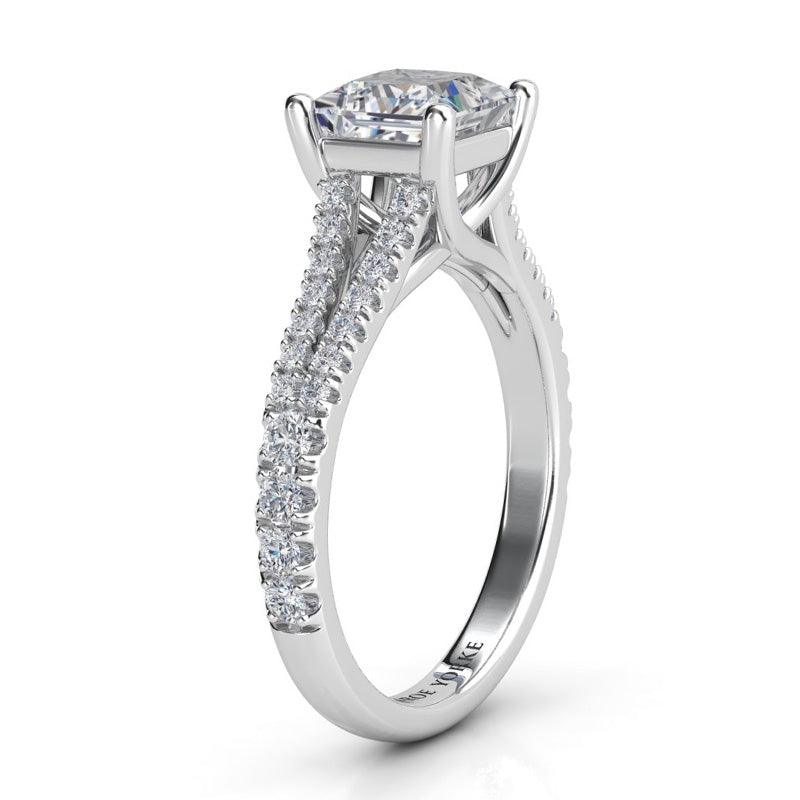 Gemma - GIA certified princess cut diamond ring. White gold. Side View showing split band and the cross over centre setting