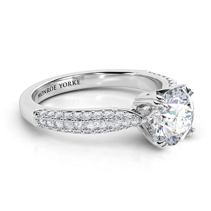 Harper - Side view showing double claw centre setting and pave set diamonds in 3 rows on the band. — view 3