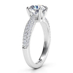 Harper in platinum - Side view 2 showing pave set diamonds in 3 rows on the band and the beautiful centre setting. 