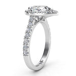 Iris - Platinum GIA certified pear cut diamond halo engagement ring.  Side view showing diamonds on the sweep up band. 