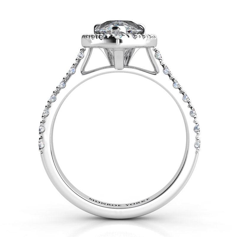 Iris - Platinum GIA certified pear cut diamond halo engagement ring.  Side view showing centre setting