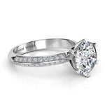Juliet in platinum.  Side view, showing the beautiful 6-calw centre setting and the pave set diamonds on the band.