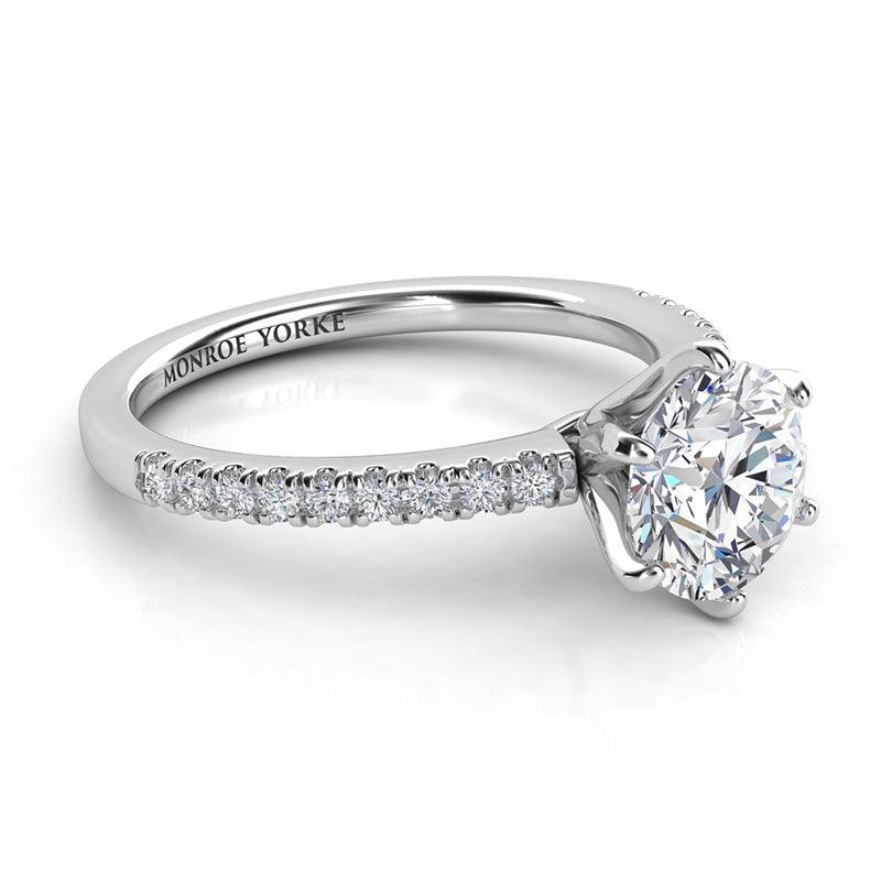 Diamond engagement ring with Side diamonds. Centre six claw setting — view 3