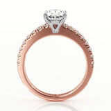 Kendall oval diamond engagement ring in rose gold.  Side view showing the beautiful centre setting and diamonds on the band 