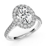 Laurel Oval Diamond Halo Engagement Ring with diamonds on the band. White gold 
