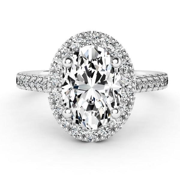 Oval Cut Diamond Ring with a Diamond Halo, created in white gold
