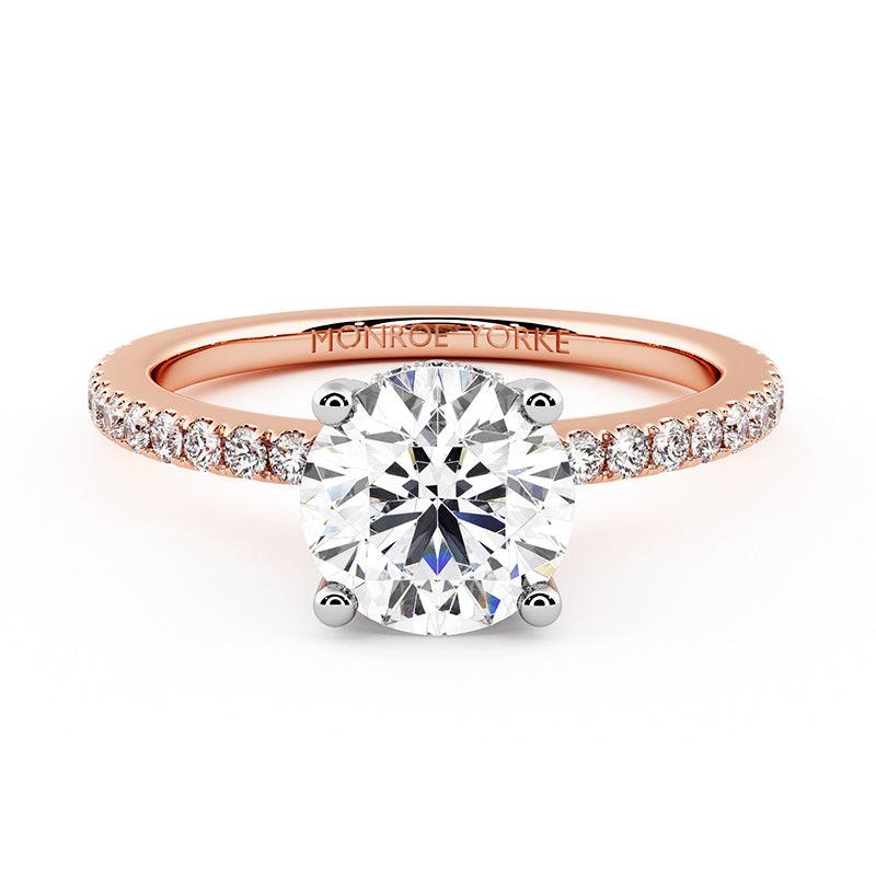 Liliana in Rose Gold - Unique rose gold engagement ring.  Hidden halo around the girdle of the main diamond.  