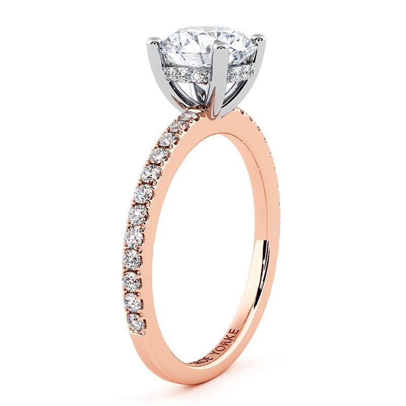 Unique Liliana in Rose Gold - Hidden halo around the girdle of the main diamond.  Diamonds on the band.  