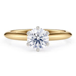 Love - solitaire ring with a lab grown diamond.  Gold band.  Centre diamond in a 6 claw setting. 