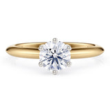 Love - solitaire ring with a lab grown diamond.  Gold band.  Centre diamond in a 6 claw setting. 