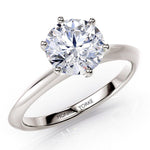 Top view - 1.50 carat round lab grown / lab created diamond. Beautiful knife edge band.  Centre diamond in a 6 claw setting. 