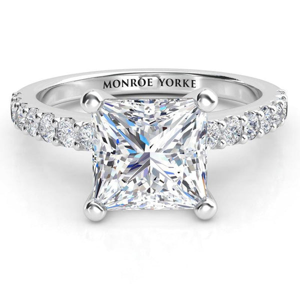 GIA certified princess cut diamond engagement ring with side diamonds. White gold 