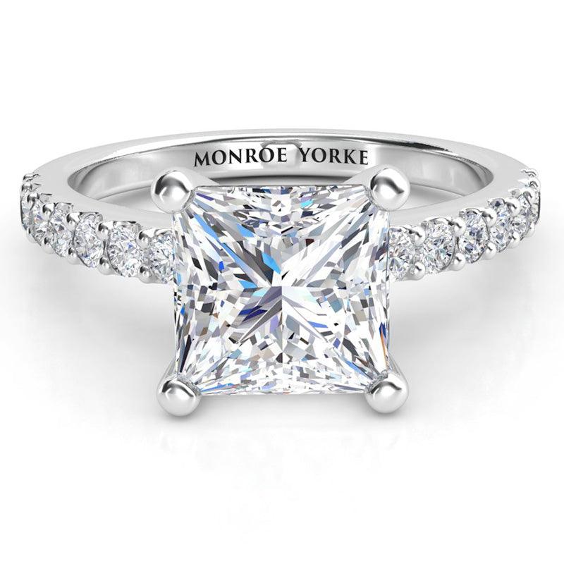GIA certified princess cut diamond engagement ring with side diamonds. White gold 