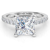 Princess cut diamond engagement ring with diamonds on the band. Lutece in platinum. 