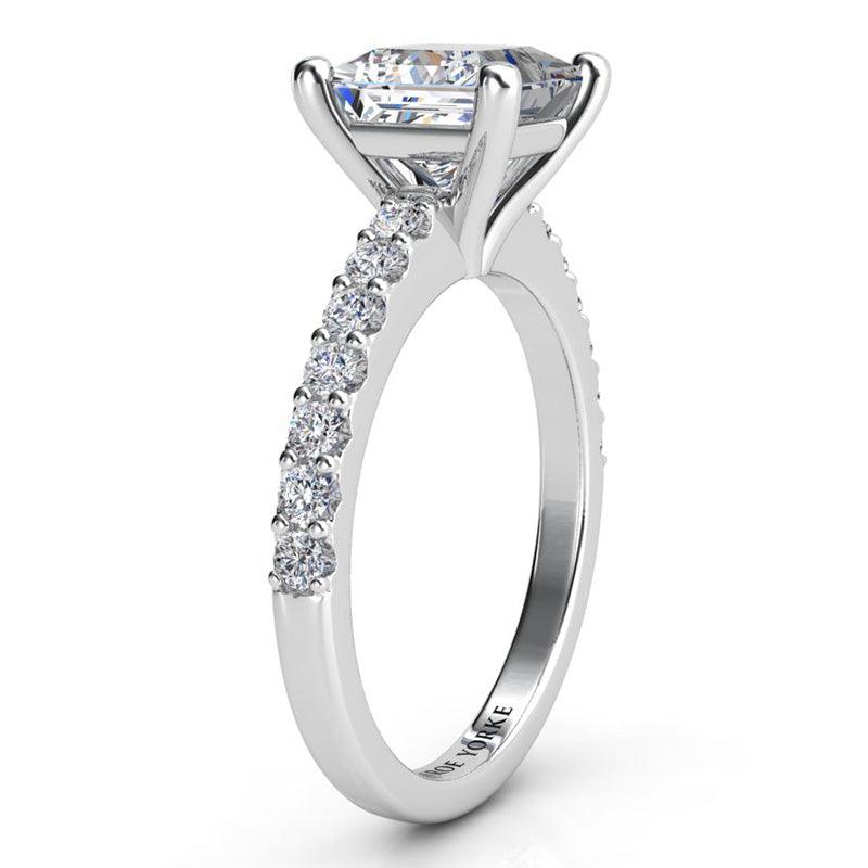 Lutece in platinum. Princess Cut Diamond Ring - Side view showing 4 claw setting.