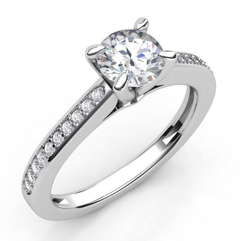 May in platinum - 4 Claw round diamond engagement ring with diamonds on the band. 