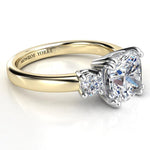 Meghan - Three diamond ring. Centre Cushion diamond and rounds on sides. 
