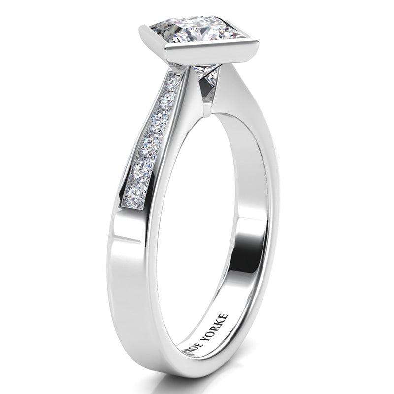 Nash diamond ring, side view showing channel set diamonds on the shoulder 